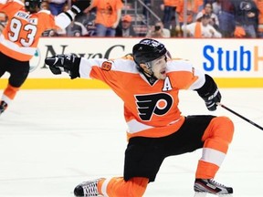 Danny Briere shows off his signature goal celebration as a member of the Philadelphia Flyers during an NHL playoff game against the Pittsburgh Penguins on April 22, 2012.