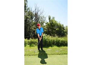 Derek Baker of the Windermere Golf & Country Club demonstrates how to make bump-and-run chip shots.