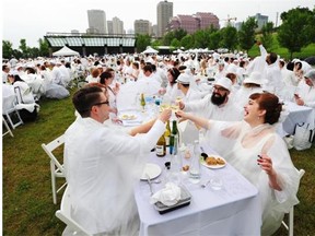 Diner en Blanc, a gathering of about 1,200 people all dressed in white with picnic baskets, tables and chairs, at Louise McKinney Park in Edmonton last summer. This year’s top-secret, elegant event takes place Sept. 3.