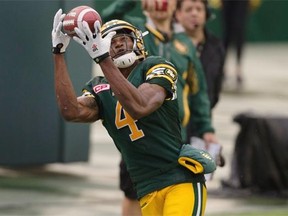 Edmonton Eskimos’ Adarius Bowman makes a catch for his second touchdown against the Winnipeg Blue Bombers during second-half CFL action on July 25, 2015 at Commonwealth Stadium.