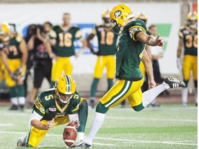 Edmonton Eskimos kicker Grant Shaw, right boots the game-winning field goal against the Montreal Alouettes on the last play of Thursday’s Canadian Football League game at Percival Molson Memorial Stadium in Montreal.