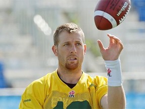 Edmonton Eskimos quarterback Matt Nichols plays catch with himself during Friday’s practice at Clarke Field.