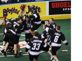 Edmonton Rush celebrate their win over the Toronto Rock to win the National Lacrosse league Champion’s Cup on June 5 at Rexall Place.