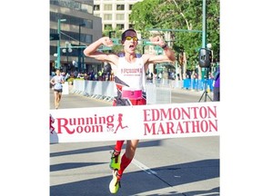 Edmontonian, Tom McGrath, wins the Edmonton Marathon, on August 23, 2015.