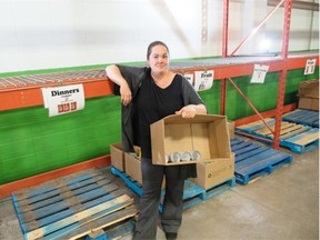 Food bank usage has recently increased across the province, including in Edmonton, which now serves roughly 3,000 more people per month than it did last September. Shown here is Tamisan Bencz-Knight, spokesperson for the Edmonton Food Bank.