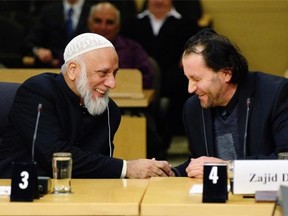 From left, Professor Syed Soharwardy of the Islamic Supreme Council of Canada and Muslims Against Terrorism and Zajid Delic, an imam, appear at a Senate national defence committee in Ottawa on Feb. 2, 2015, to discuss security threats facing Canada.