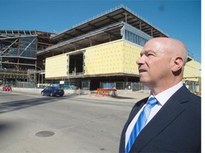 Gateway Casinos CEO Tony Santo in front of the new Grand Villa Edmonton Casino in Ice District in Edmonton on Wednesday.