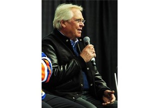 Glen Sather answers questions during the Edmonton Oilers’ 1984 Stanley Cup team reunion at Rexall Place on Oct. 8, 2014.