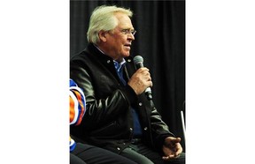 Glen Sather answers questions during the Edmonton Oilers’ 1984 Stanley Cup team reunion at Rexall Place on Oct. 8, 2014.