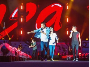 (L-R) Harry Styles, Liam Payne, Niall Horan and Louis Tomlinson of One Direction perform on stage at Century Link Field on July 15, 2015 in Seattle, Washington.