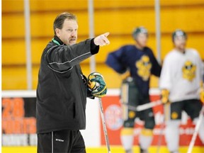 Head coach Ian Herbers runs the University of Alberta Golden Bears hockey practice at Clare Drake Arena on Nov. 20, 2013.
