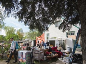 A home in the McKernan neighbourhood has set up a yard sale that has drawn the ire of neighbours, in Edmonton on Aug. 6, 2015.