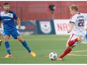 Indy Eleven’s Zach Steinberger (22) takes a shot during the dying seconds of his team’s 2-0 loss to FC Edmonton during a match in Edmonton on August 5, 2015.