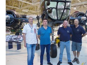 Russian pilots Valentin Lavrentyev and Sergey Baranov, and American silots Jeff Geer and Allan Snowie stop at the Alberta Aviation Museum Tuesday, July 21, 2015, in the midst of their re-creation flight of the Alaskan-Siberian air route to commemorate the 70th anniversary of the end of the Second World War.