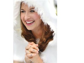 Kristy Turczyk recycled the fur-trimmed cape she had worn for her winter wedding.