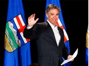 PC Leader Jim Prentice speaks on stage in Calgary following his party’s loss in the May 5, 2015 provincial election. If the PCs ever hope to regain power in Alberta, they’ll have to forget the notion of uniting with the Wildrose party, argues former PC cabinet minister Dennis Anderson.