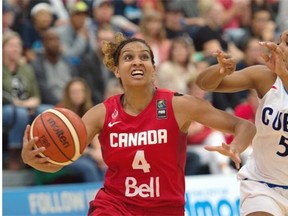 Miah-Marie Langlois (4), left, and Ineidis Casanova (5). Canada beats Cuba 82-66 for the gold at the FIBA Americas Women’s basketball tournament in Edmonton. August 16, 2015.