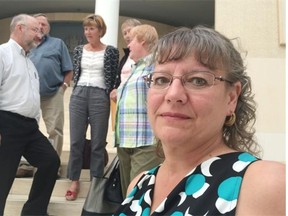 Laurie Thiesen (front) stands outside Edmonton council chambers with other members of the West Jasper Place community league on Aug. 24, 2015.