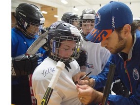 Oilers’ goalie Cam Talbot expects a battle for the No. 1 goaltending spot this season. He joined young players at the annual Oilers hockey school at Servus Place Credit Union in St. Albert on Tuesday.