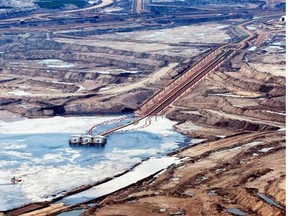 Oilsands development near Fort McMurray is seen in this July 10, 2012 aerial file photo. Albertans need to know sooner rather than later that Premier Rachel Notley does not and will not tolerate federal disdain for the lifeblood of the province’s economy, the Journal says in an editorial.