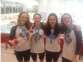 Olympian swimmers (left to right) Sarah Knott, Pilar McCann, Natalia Howat and Amelia Putkaradze celebrate their success at the Canadian Age Group Championships.
