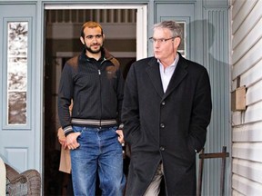 Omar Khadr and his lawyer Dennis Edney come out of Edney’s house on Thursday May 7, 2015.