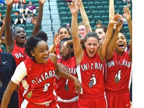 Ontario celebrates beating Quebec during the gold medal match of the 2015 U15 National Girls Basketball Championships at the Saville Sports Centre in Edmonton on Wednesday. Ontario won the game 65 to 49.