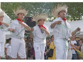 Performers with the Ecuadorian  pavilion during the 40th annual Heritage Festival in Hawrelak Park in Edmonton on August 1, 2015.