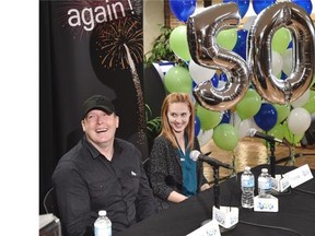 Raymond Scott with his wife Sheena at a news conference after winning the Aug. 7 $50 million Lotto Max draw jackpot, at Alberta Gaming and Liquor Commission in St. Albert, August 20, 2015.
