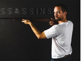 Scott Shpeley, who plays Lee Harvey Oswald and the Balladeer in Assassins, at the 2015 Edmonton Fringe.