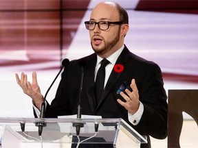 Sean Michaels speaks after winning the Giller Prize for his book Us Conductors at the awards ceremony in Toronto on Nov. 10, 2014.