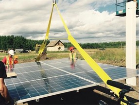 A solar panel is installed at the Lubicon Lake First Nation community of Little Buffalo’s community health centre.