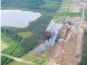 Spilled oil rests on the dirt and grass near Nexen’s Long Lake facility near Fort McMurray on Friday, July 17, 2015. The spill, which is enough to fill two Olympic-sized swimming pools, was discovered Wednesday afternoon.