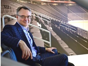 Stew MacDonald, Oilers Entertainment Group, shows off the lower bowl seats using the latest virtual-venue technology that will give the fans an experience what the finished Rogers Place with look like, at the Rogers Place Presentation Centre in Edmonton, July 23, 2015.