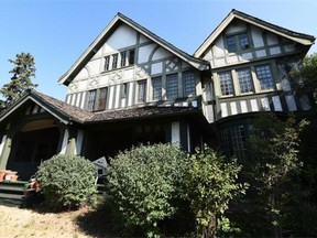 The Villa, a green-and-white Tudor mansion that sits on the edge of the Groat Ravine built in 1912, stands for sale in Edmonton on July 9, 2015.