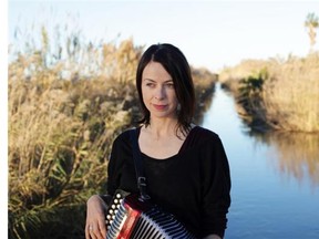 Wendy McNeill adds a touch of flamenco to her folk sound when she visits the Blue Chair Cafe Friday, July 31 at 8:30 p.m.