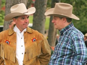 What a difference a year makes for both Jim Prentice, who was poised to become PC leader in Alberta, and federal Tory leader Stephen Harper, who was three years into his third mandate as prime minister. The two men are shown in this 2007 file photo from Calgary.