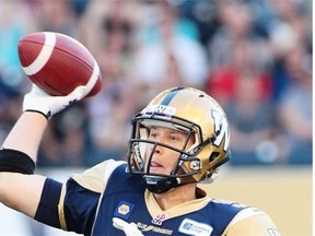 Winnipeg Blue Bombers quarterback Drew Willy prepares to throw the ball during a Canadian Football League game against the Ottawa Redblacks at Investors Group Field in Winnipeg on July 3, 2014.