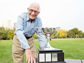 A  98-year-old Mel Petley-Jones of South Cooking Lake with the championship cricket trophy he won with different teams dating back to the 1920s. He presented the trophy to the winner of a championship cricket match at Victoria Park in 2012.