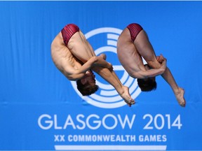 EDINBURGH, SCOTLAND - AUGUST 01:  Maxim Bouchard and Vincent Riendeau of Canada compete in the Men's Synchronised 10m Platform Final at Royal Commonwealth Pool during day nine of the Glasgow 2014 Commonwealth Games on August 1, 2014 in Edinburgh, Scotland
