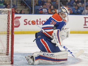 Edmonton Oilers goaltender Anders Nilsson stops a shot from the Minnesota Wild during the second period of an NHL pre-season hockey game in Saskatoon on Saturday, Sept. 26, 2015.