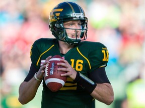 EDMONTON, AB - SEPTEMBER 6: Matt Nichols #16 of the Edmonton Eskimos looks to pass in a game between the Calgary Stampeders and Edmonton Eskimos in week 11 of the 2014 CFL season at Commonwealth Stadium on September 6, 2014 in Edmonton, Alberta, Canada.