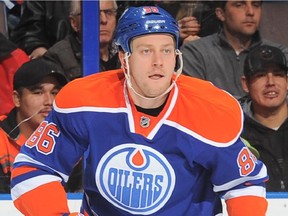 Nikita Nikitin #86 of the Edmonton Oilers skates on the ice during the game against the Chicago Blackhawks on January 9, 2015. He is playing for the Oilers farm club this year.