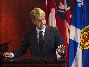 Citizenship and Immigration Minister Chris Alexander speaks to the media on Sept. 19. 2015 in Toronto about Canada's plan to provide faster help for Syrian and Iraqi refugees wishing to come to Canada.