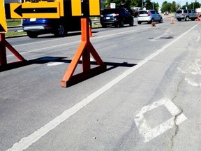 Crews repave sections of 106th Street on Aug. 18 after removing the bike lanes. On July 8th city councilors voted to remove bike lanes along 106th Street from Whitemud Drive to 34th Avenue; as well as lanes along 40th Avenue from 119th Street to 106th Street.