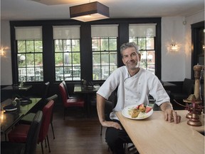 Chef/owner Cyrille Koppert with his seafood crepe, a highlight of the Manor Cafe brunch menu.