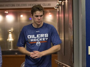 Connor McDavid makes his way to a press conference after fitness testing during the Edmonton Oilers rookie camp at Rexall Place on Sept. 10, 2015.