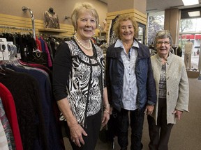 From left, Evelyn Bakker, Kay Sivak and Judy Dafoe in fashions from Trendz on 6th, a consignment ladies wear shop at 10621 100th Ave.