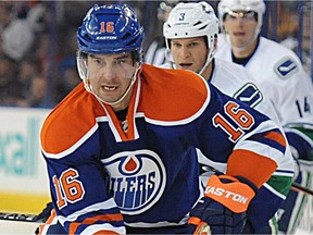 Teddy Purcell of the Edmonton Oilers skates in October 2014 NHL play against the Vancouver Canucks at Rexall Place