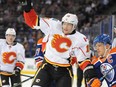 Calgary Flames defenceman Ladislav Smid collides with the Oilers Andrew Ferrence in the 2014/15 preseason.  
Shaughn Butts/Edmonton Journal